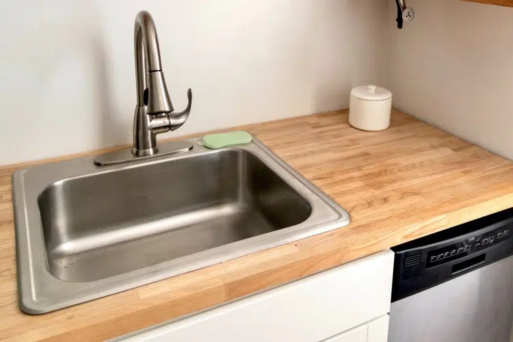 kitchen sink with wood-style benchtop